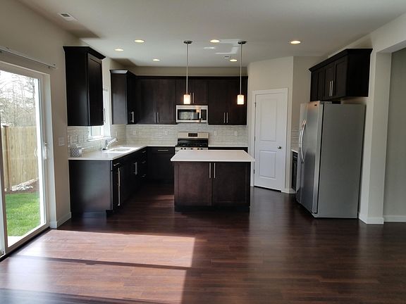 Modern kitchen with SS appliances