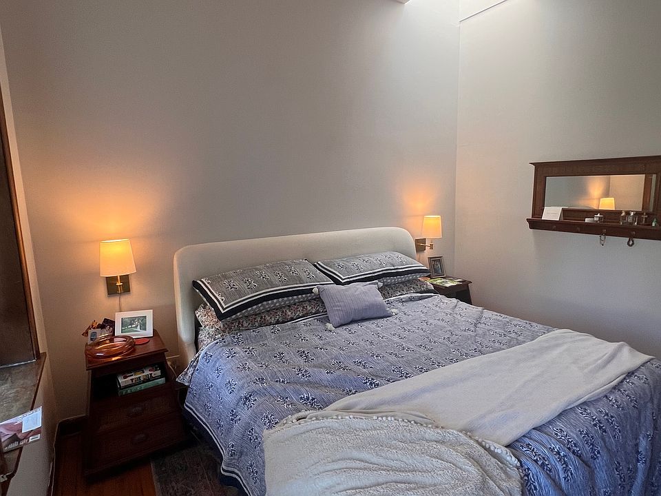 Master bedroom with 2 huge windows and skylight