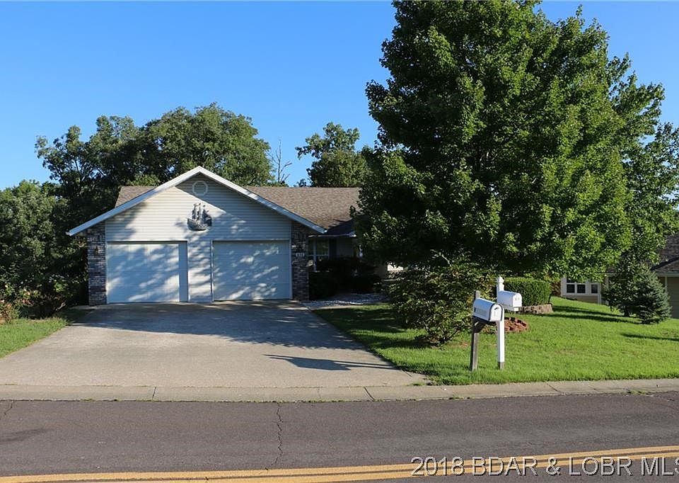 Flat Driveway on a quiet Ozark Meadows Street