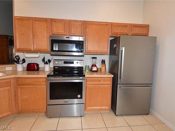 3rd image of 10351 Whispering Palms Dr #105