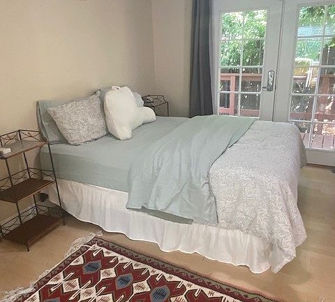 Bedroom with queen bed.