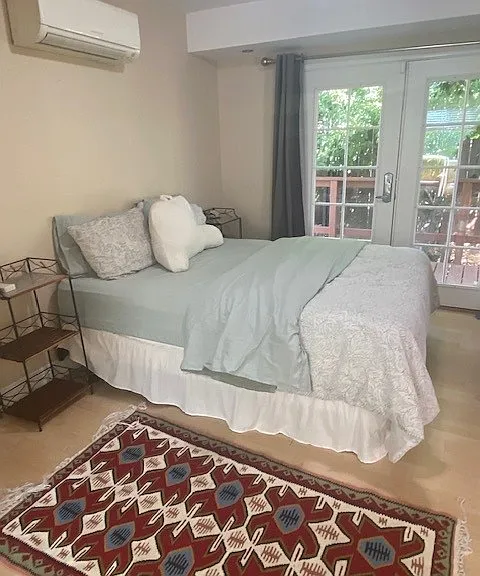 Bedroom with queen bed.