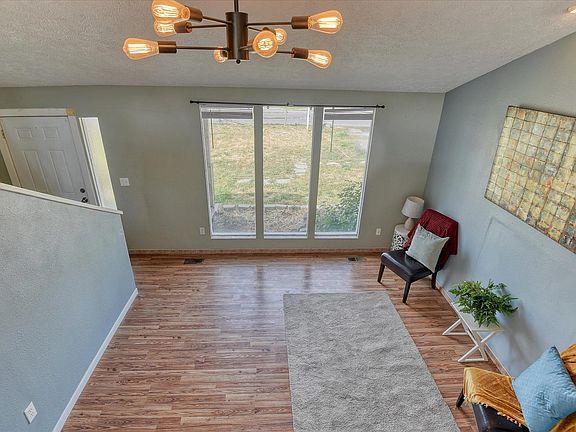 5th image of 3318 E 55th Ave