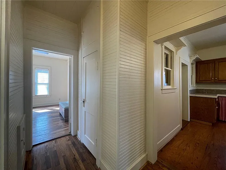 Center of Home Looking into Main Bedroom & Kitchen