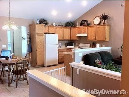 Kitchen : This large eat-in kitchen is open to great room and is perfect for entertaining!