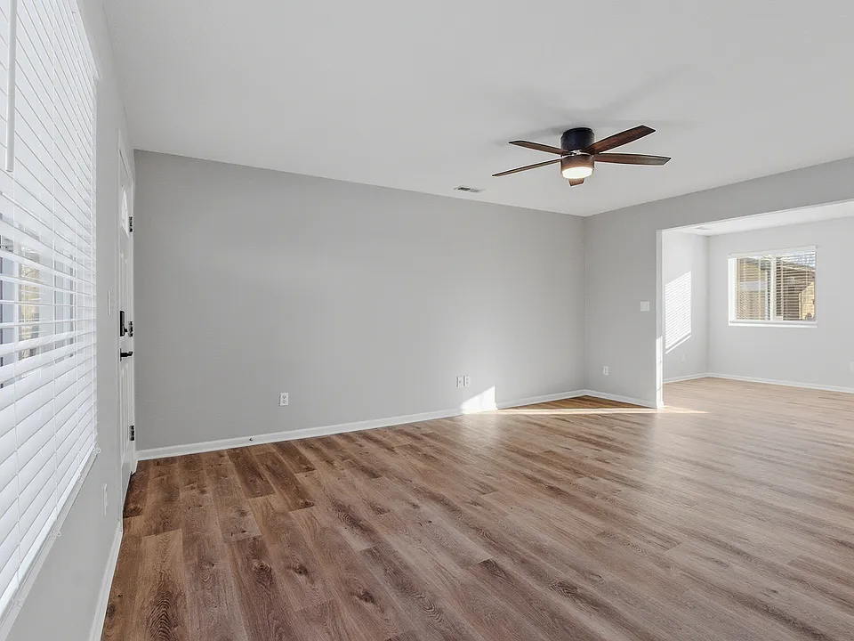 Living Room - New paint, flooring, blinds and fan
