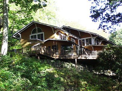 View from River : House is Hillside above South Branch Raritan River Many Decks facing River