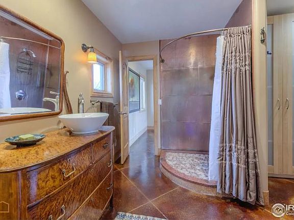 Bathroom with plenty of artsy touches