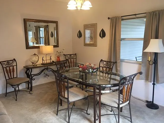 Dining table and wrought iron chairs