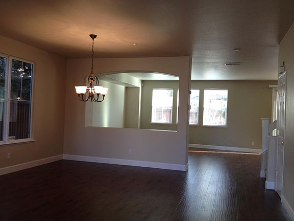 view of living room and family from front door