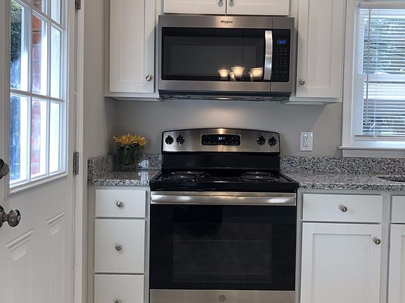 Self-cleaning oven, microwave, dishwasher, and refrigerator (plus washer/dryer) included!