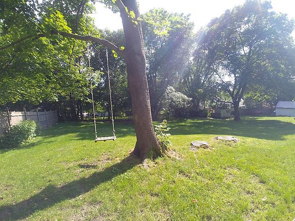 Large gorgeous backyard for play. Watch your children play from the enclosed porch.