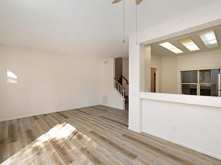 Upgraded flooring and open floorplan.