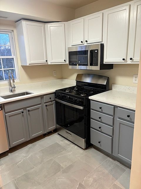 Beautiful Newly Updated Kitchen with All New Stainless-Steel Appliances Granite Countertops and Custom Tile Flooring