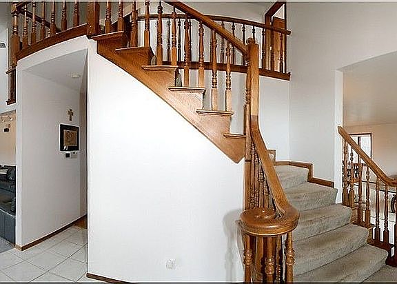 Foyer looking both ways into family room and living room.