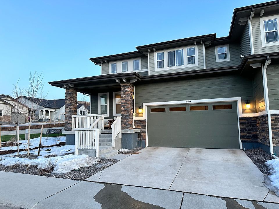 2-car garage, front porch, stonework on craftsman style home