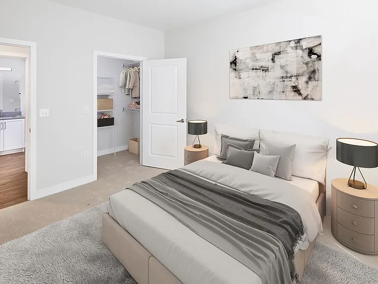 Phase II Renovated Package I townhome bedroom with carpet