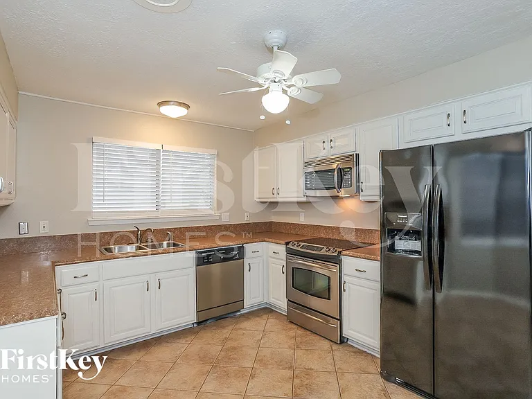 613 W Castle Harbour Dr — Photo 6