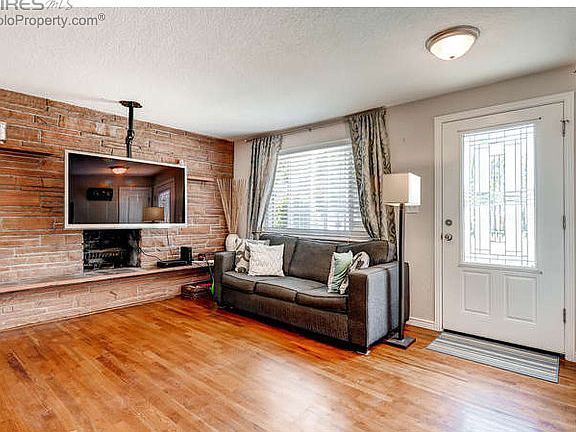 Living Room w/ Stone Fireplace