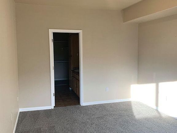 Master Bedroom leading into the master bathroom with walk in closet