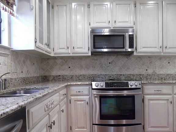 Granite countertops, tile back splash