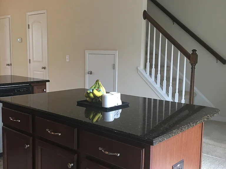 Central cooking island with Pendant Lights and Charging or electrical outlets
