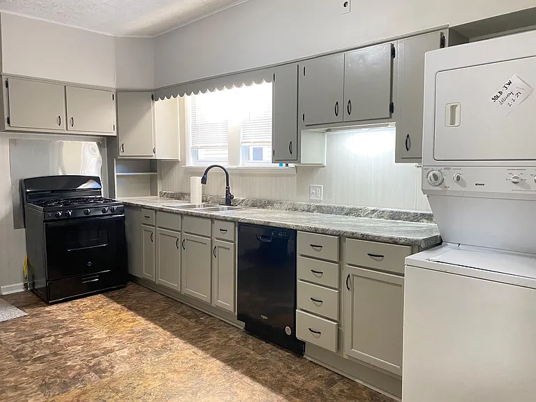 Kitchen: 12 feet of counterspace, extra lighting, dishwasher, gas stove, laundry center