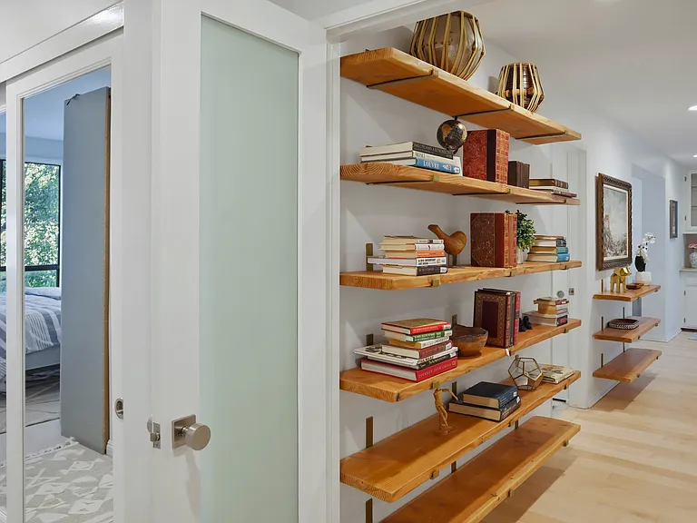 Hallway into primary bedroom