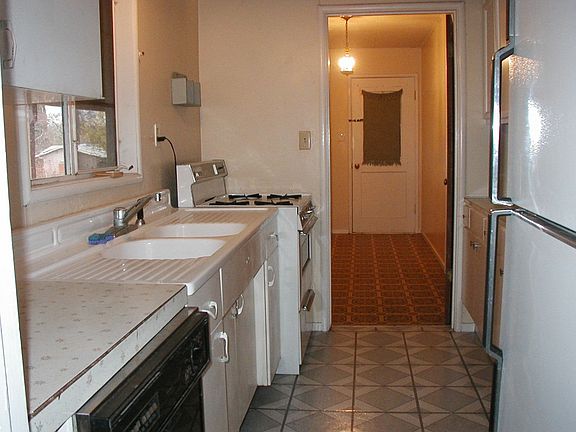 Kitchen with laundry room in back