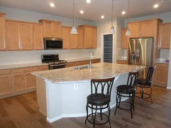Granite Kitchen Island and Pantry