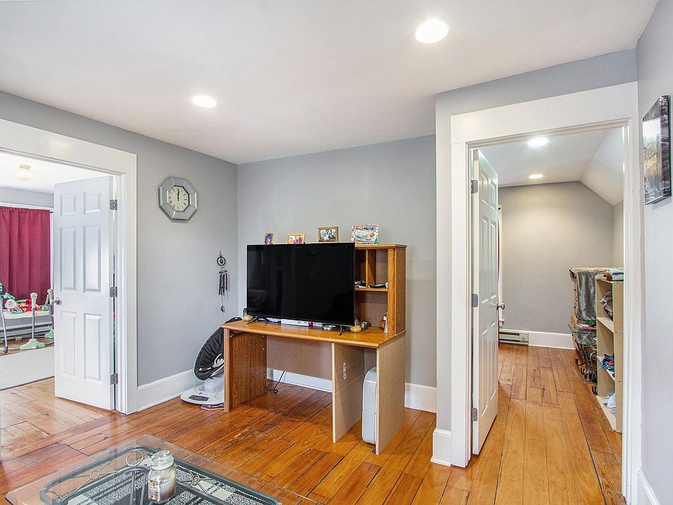 Living Room With Both Bedroom Entries