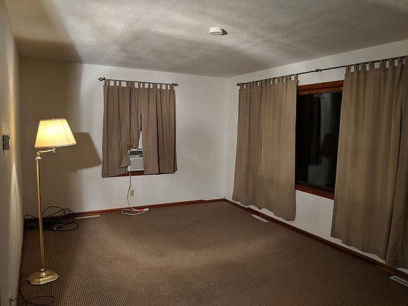 Living room 15.5'x19'. Window A/C. TV by satellite. Front door access.