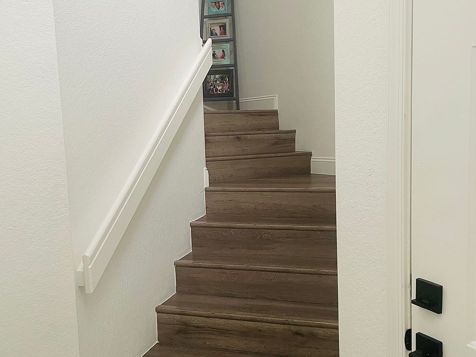 Stairs from the main entrance and garage