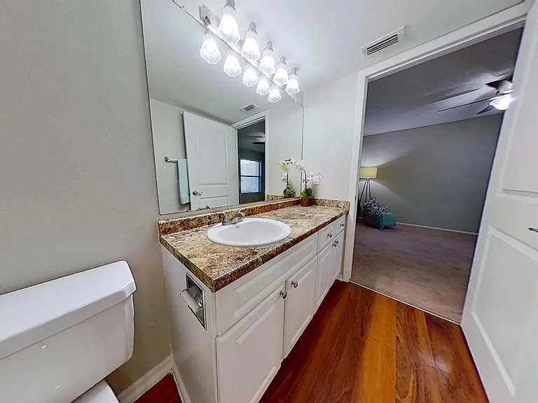 The Newport Autograph floor plan features granite countertops, ample storage, and direct access to the bedroom. This space is designed to provide a seamless blend of functionality and comfort.