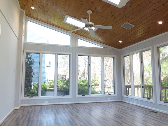 Sunroom has vaulted ceilings