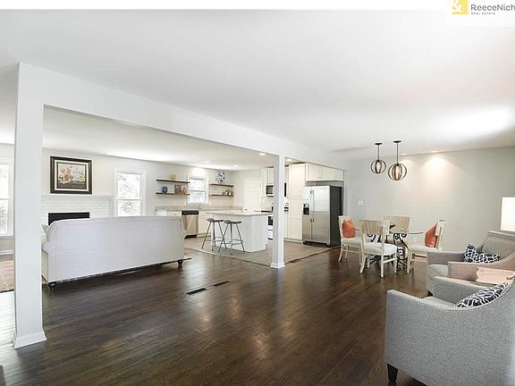 You will love this open floor plan concept with gleaming hardwoods!