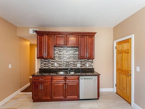 Brand new double sink with disposal and dish washer