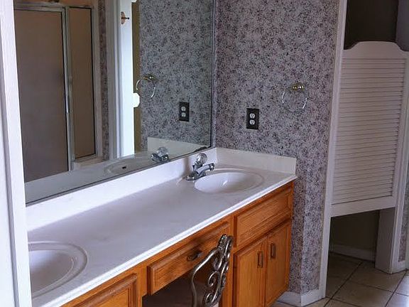 Large master bath has double sinks