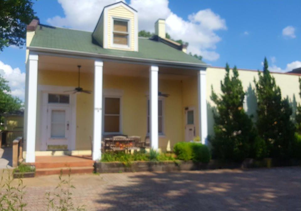 Exterior of House with Bricked Patio
