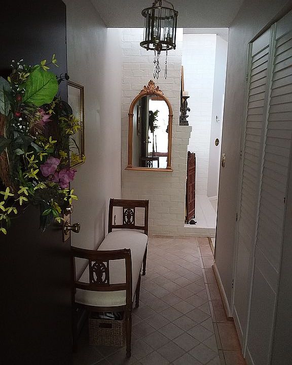 Foyer with mosaic tile