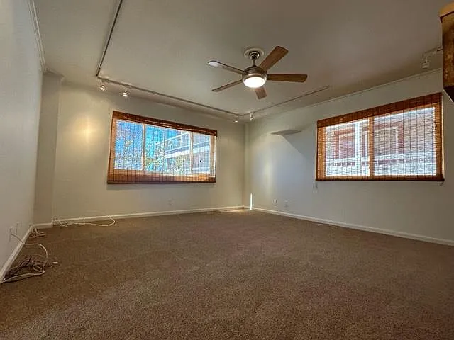 The main living area with a big window for that cooling breeze.