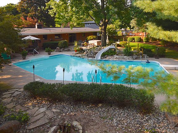 Beautiful professional landscaped yard for family gatherings, friends hanging out, or just a relaxing dip in your private pool/hot tub... Just a few of the activities this backyard can provide for you