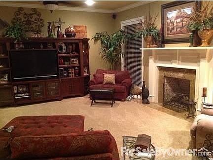 Great Room : WBFP w/ granite hearth & surround; burns gas logs or wood. Surround sound