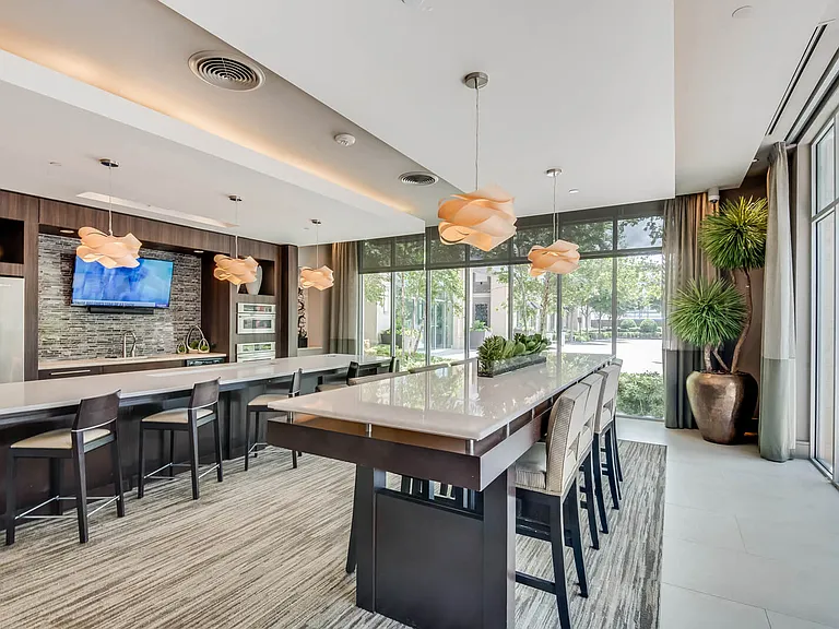 HDTV lounge with billiards and fully-equipped kitchen