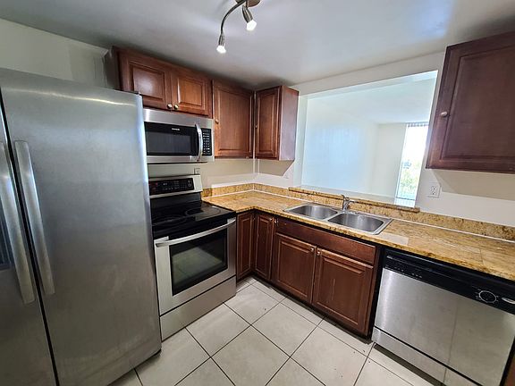 3rd image of 496 NW 165th St #D409