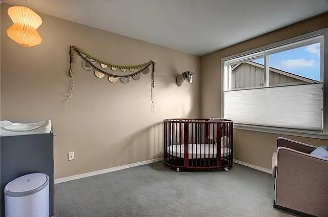 Upstairs bedroom - note wall has been since painted with a m