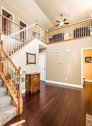 Breathtaking 2 story entryway with powder room