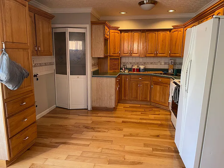 Kitchen, custom cabinets, tons of storage, W&D hookups