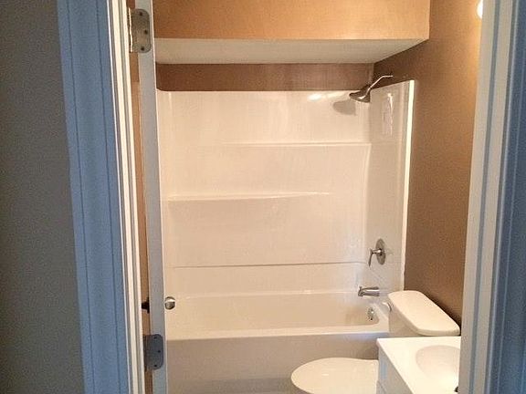 Bathroom features new tub and surround