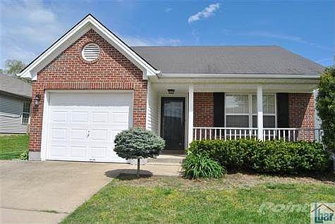 Covered front porch welcomes you and your guests with protection from the elements.